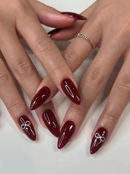 GARNET BOW NAILS